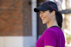 Low Wavy Ponytail with a Cap